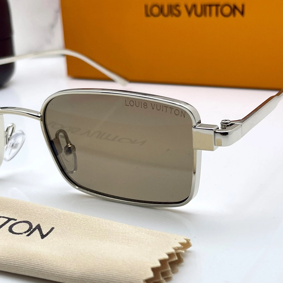 Louis Vuitton 3214 silver brown
